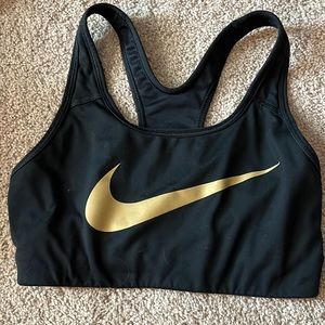 Nike gold swoosh sports bra